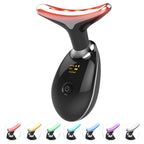 Black electronic device with red light on top, control panel, and color-changing attachments on a white background.