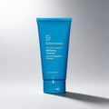 Blue tube of Dr. Dennis Gross skincare product on a gray background