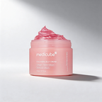 Pink jar of Medicube Collagen Jelly Cream on a light gray background