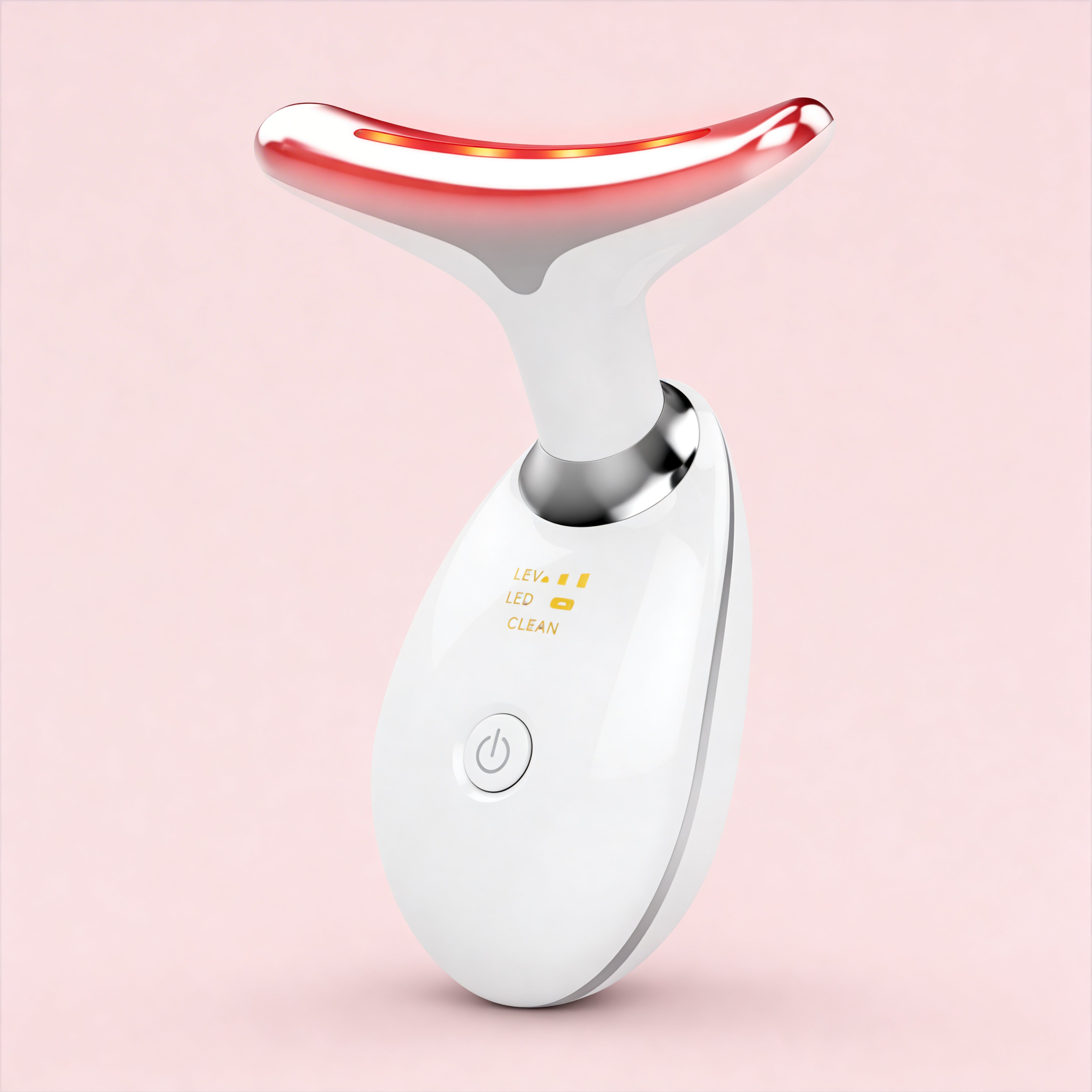 White and red skincare device on a pink background
