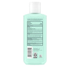 Mint green bottle with label on a white background
