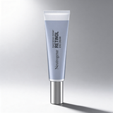 Neutrogena Retinol Eye Cream tube on a gray background