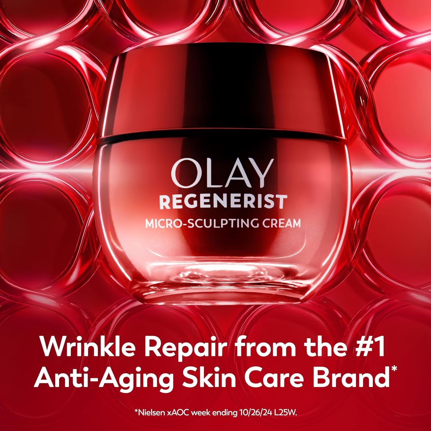 Olay Regenerist micro-sculpting cream jar on a red background with text about anti-aging skin care.