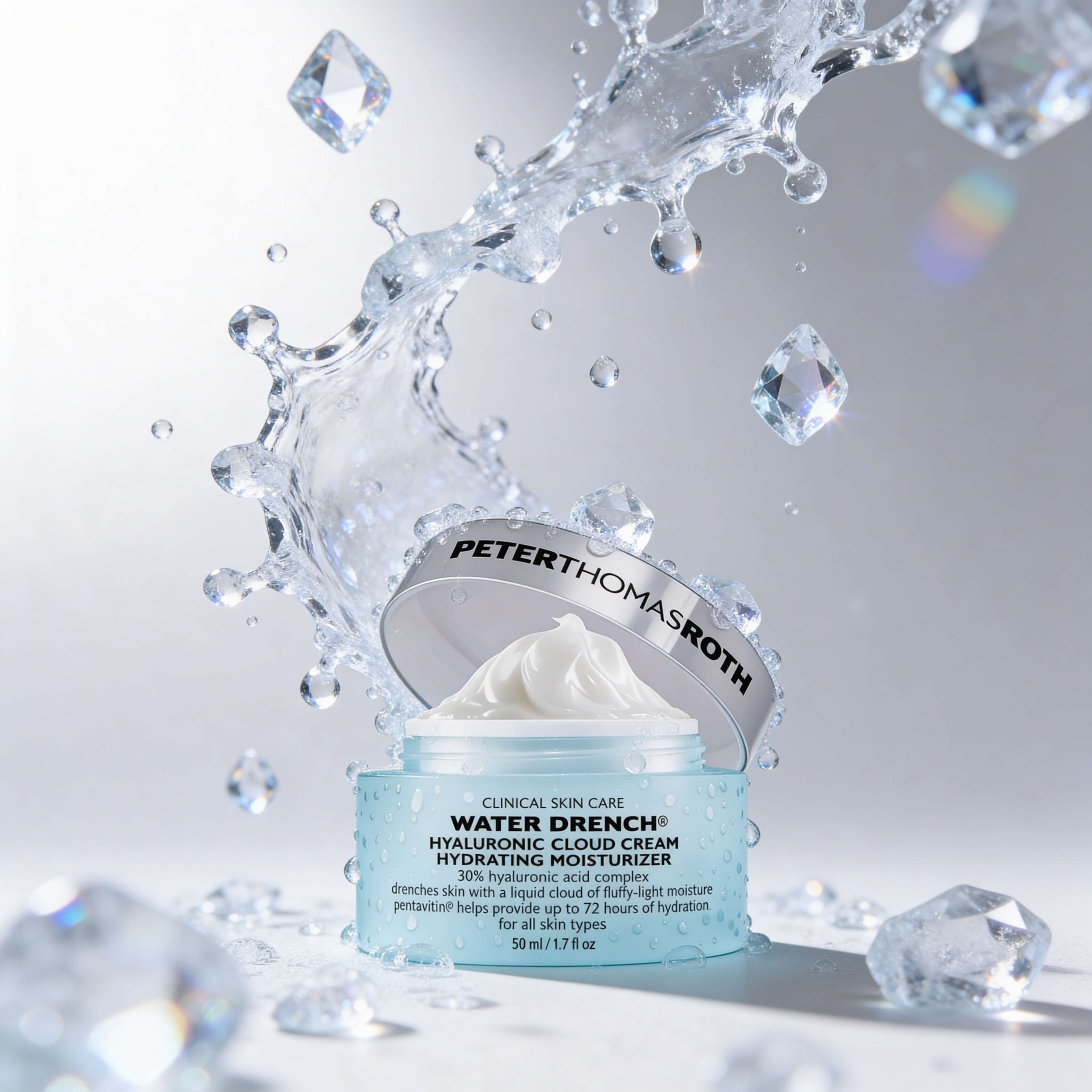 Peter Thomas Roth Water Drench Hyaluronic Cloud Cream with water droplets and diamonds on a gray background