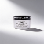 Peter Thomas Roth FirmX Collagen Moisturizer jar on a gray background