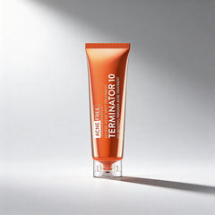 Tube of Acne Free Terminator 10 treatment on a gradient gray background